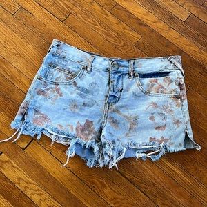 EUC FREE PEOPLE DISTRESSED FLORAL SHORTS
